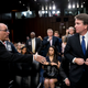 Fred Guttenberg, the father of Jamie Guttenberg who was killed in the Stoneman Douglas High School shooting in Parkland, Fla., left, attempts to shake hands with President Donald Trump’s Supreme Court nominee, Brett Kavanaugh, right, as he leaves for a lunch break while appearing before the Senate Judiciary Committee on Capitol Hill in Washington, Tuesday, Sept. 4, 2018, to begin his confirmation to replace retired Justice Anthony Kennedy. Kavanaugh did not shake his hand.